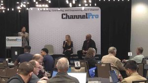 Seana Fippin (L) and Corey Kirkendoll (R) discuss vCISO services