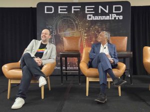 Justin Esgar and Philip de Souza at Irvine cybersecurity conference for MSPs